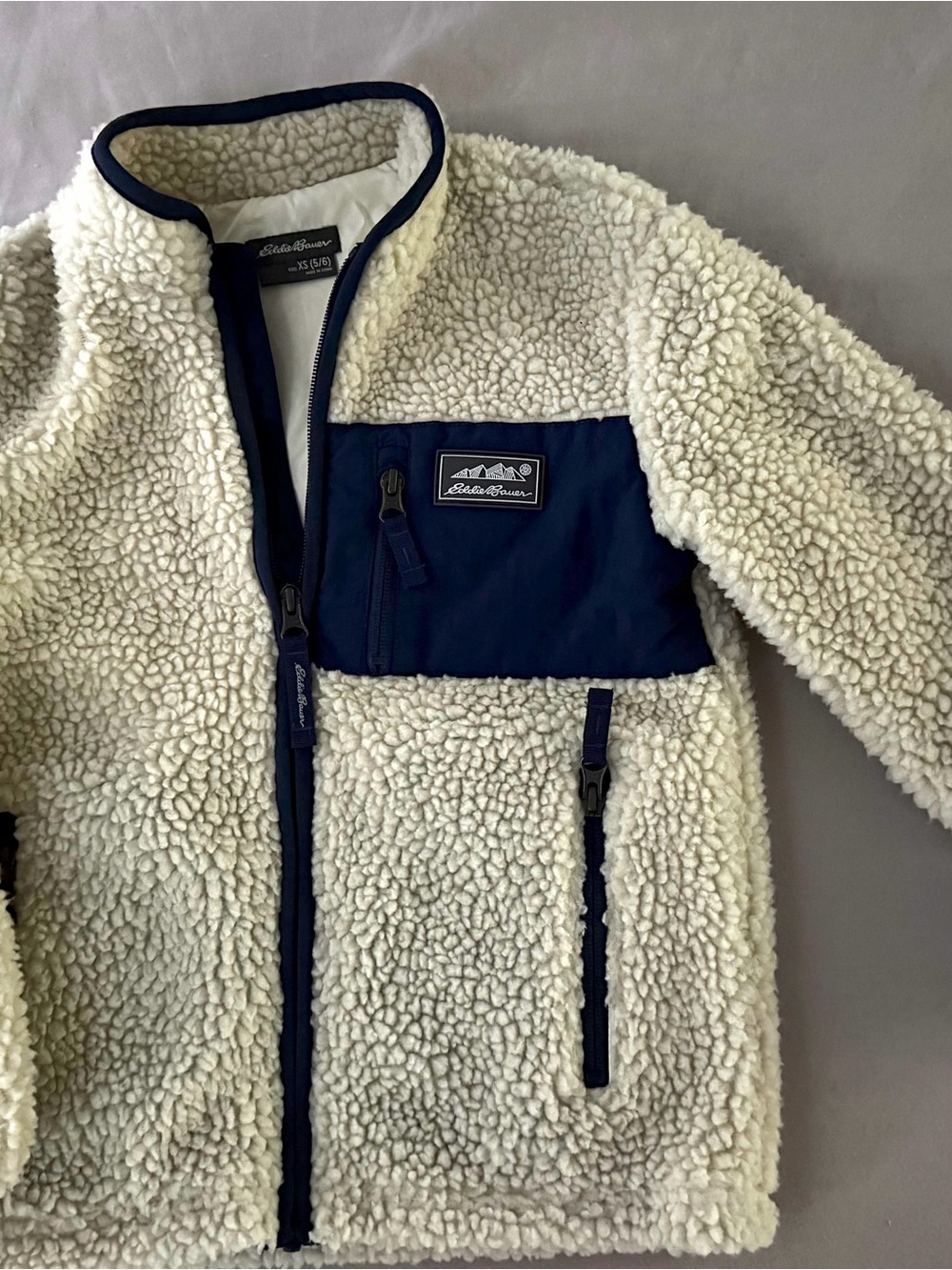 Eddie Bauer Cream Sherpa Jacket with Navy Chest Panel and Trim